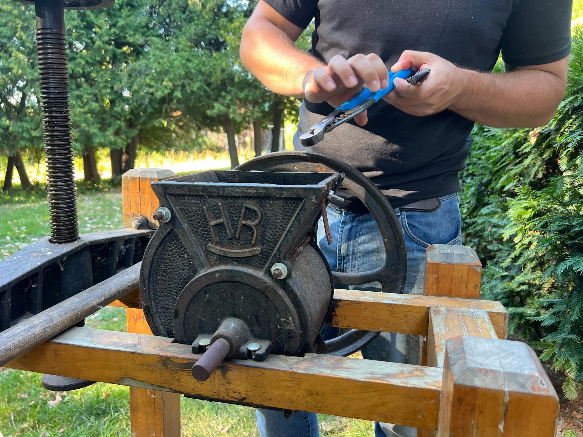 Pressing apples with the cider crusher